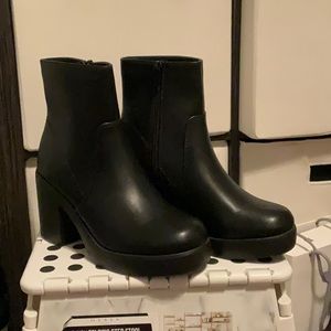 Black heeled boots.